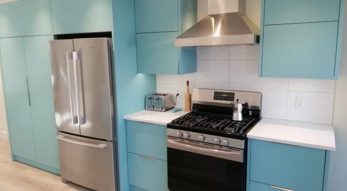 Aluminum kitchen cabinets including pantry in Robin's Egg Blue