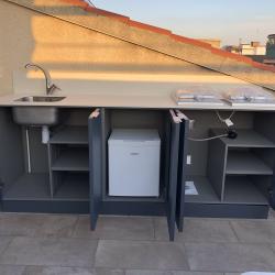 Outdoor aluminum kitchen in Anthracite Grey storage in cabinets for fridge, propane and waste