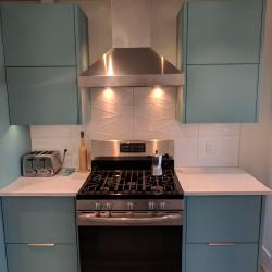 Aluminum kitchen cabinets including pantry in Robin's Egg Blue