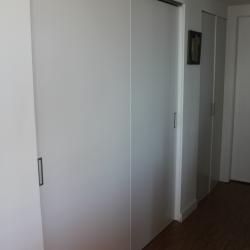 white sliding closet doors aluminum non-toxic sustainable cabinetry
