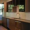 grey lower cabinets with high-gloss black upper cabinets in Victoria BC