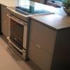grey all aluminum cabinets with slide-in stove Victoria BC