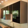 Aluminum cabinetry high-gloss black upper cabinets Oak Bay Victoria