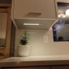 bone white aluminium galley kitchen under cabinet LED lighting