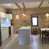 white textured aluminum non-toxic kitchen cabinets stone wall Languedoc Rousillon Pezenas