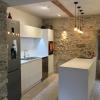 white textured aluminum non-toxic kitchen cabinets stone wall Languedoc Rousillon Pezenas